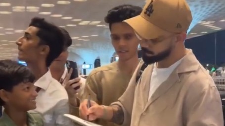 Watch: Virat Kohli leaves for the USA, gives autograph to fan at Mumbai Airport